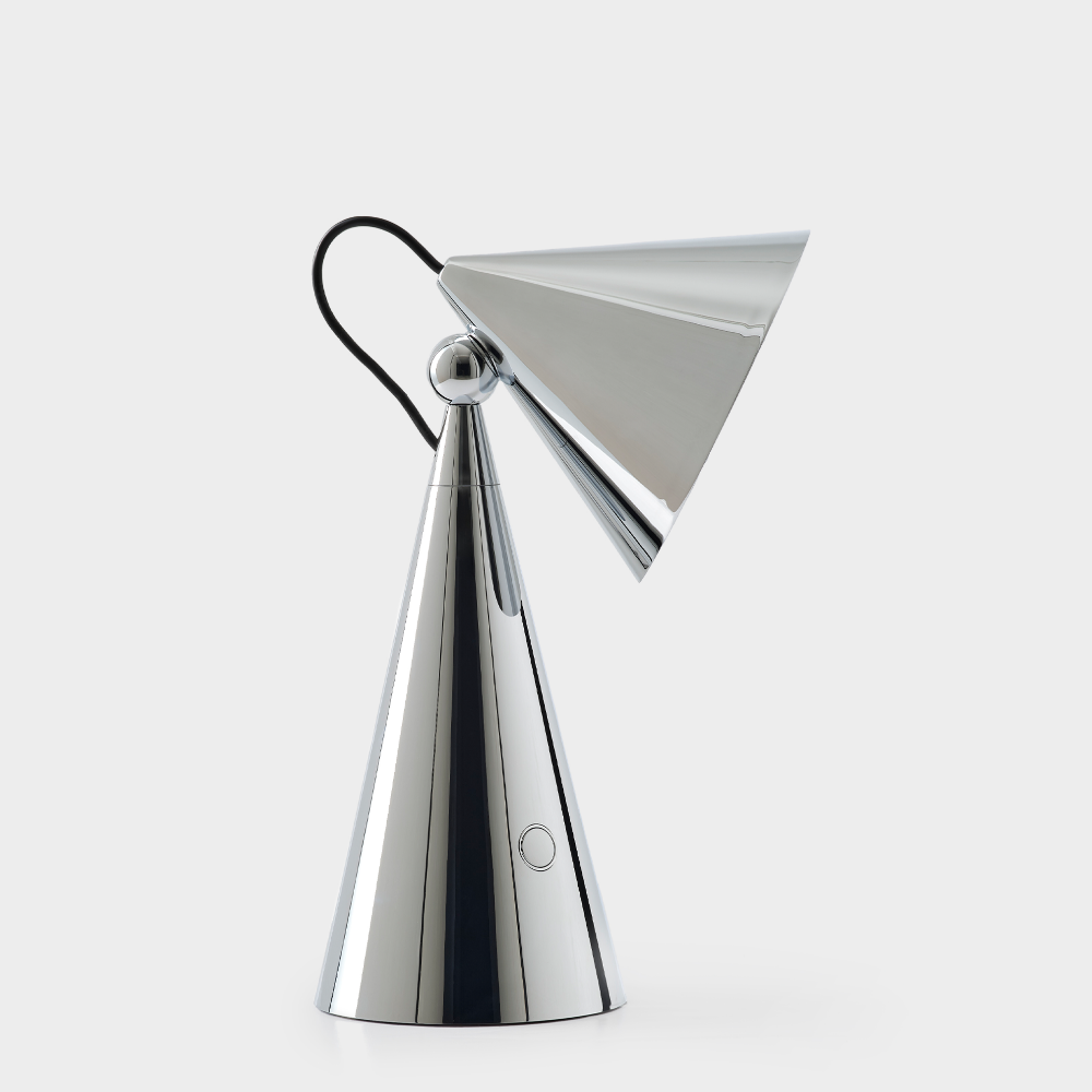 Modern silver lamp with a cone-shaped shade on a white background
